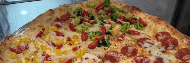 Large pizza with a different topping on each section
